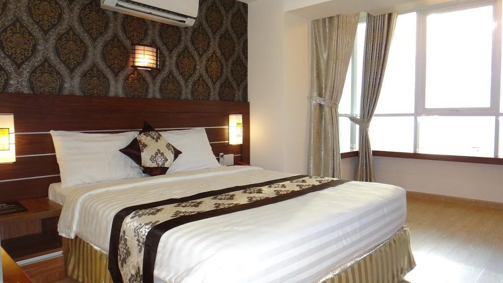 Minh Nhat Hotel Nha Trang Værelse billede