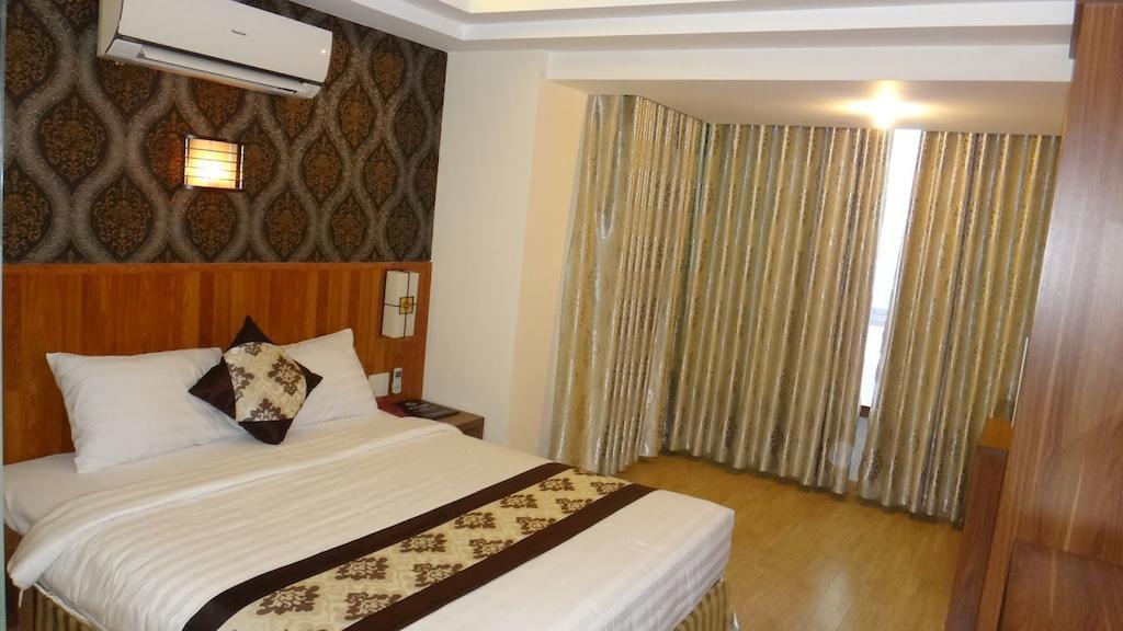 Minh Nhat Hotel Nha Trang Værelse billede