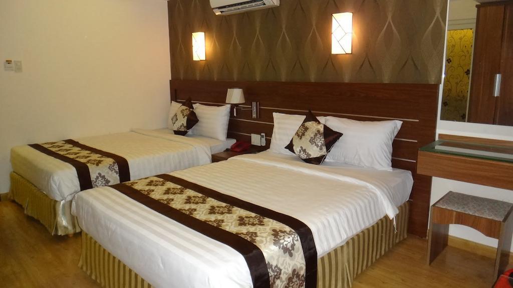 Minh Nhat Hotel Nha Trang Værelse billede