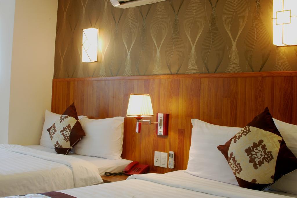 Minh Nhat Hotel Nha Trang Værelse billede