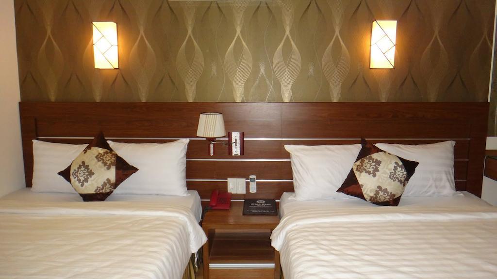 Minh Nhat Hotel Nha Trang Værelse billede